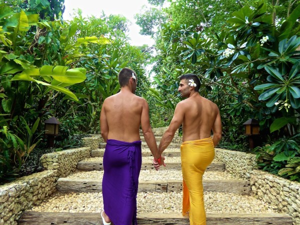 02a-Mandala-Spa-Seb-Stef-sarongs-holding-hands.jpg