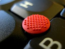 220px-Mouse_pointing_stick.jpeg