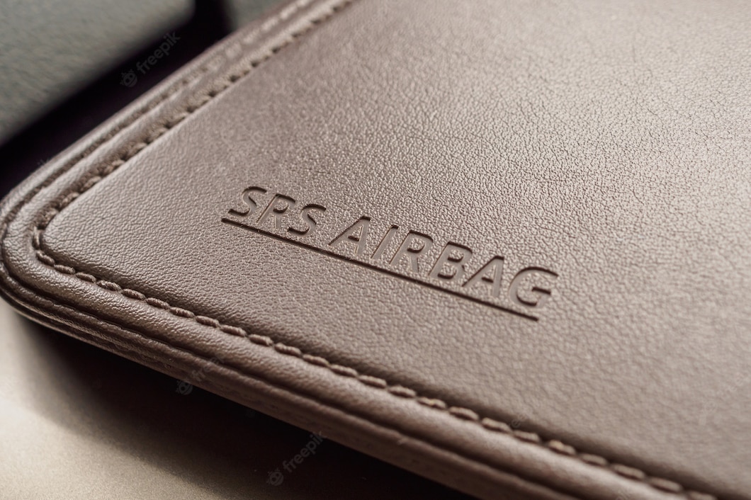 airbag-safety-sign-brown-leather-texture-modern-car_293060-201.jpg