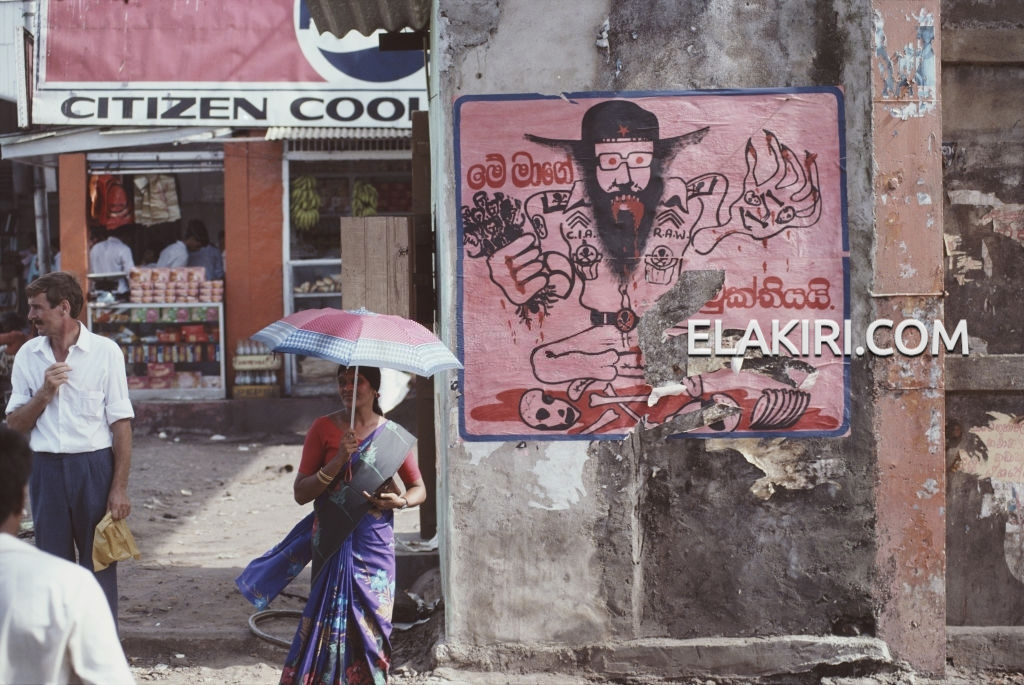 An anti-JVP government propaganda poster portraying Marxist politician Rohana Wijeweera as a t...jpg