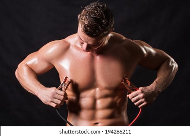 athlete-holds-high-voltage-wires-260nw-194266211.jpg