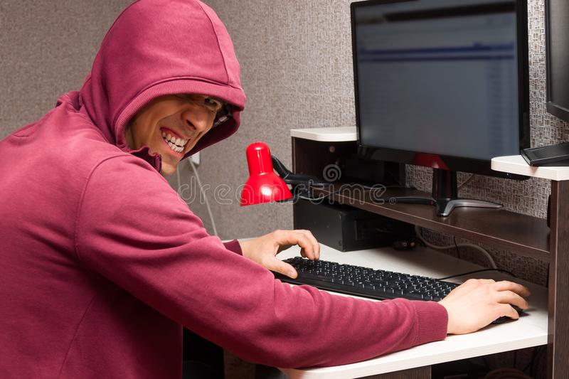 internet-troll-evil-face-using-computer-very-bad-man-laughs-wickedly-writing-nasty-things-foru...jpg