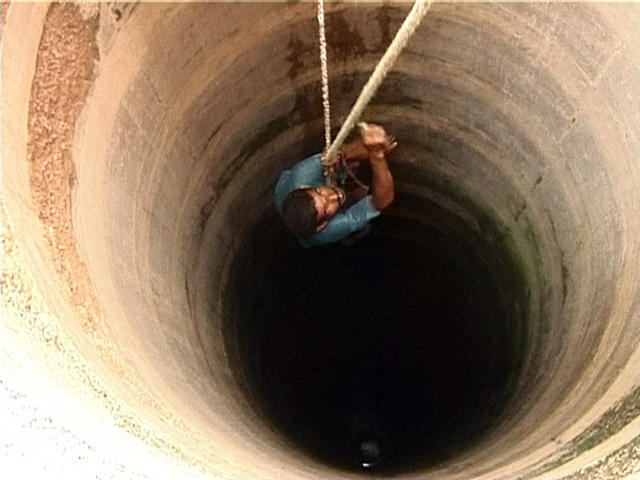 man_well-hanging-by-a-thread-hold-on-struggling-trust-hopeless-lost-helpless-feeling-hanging-b...jpg