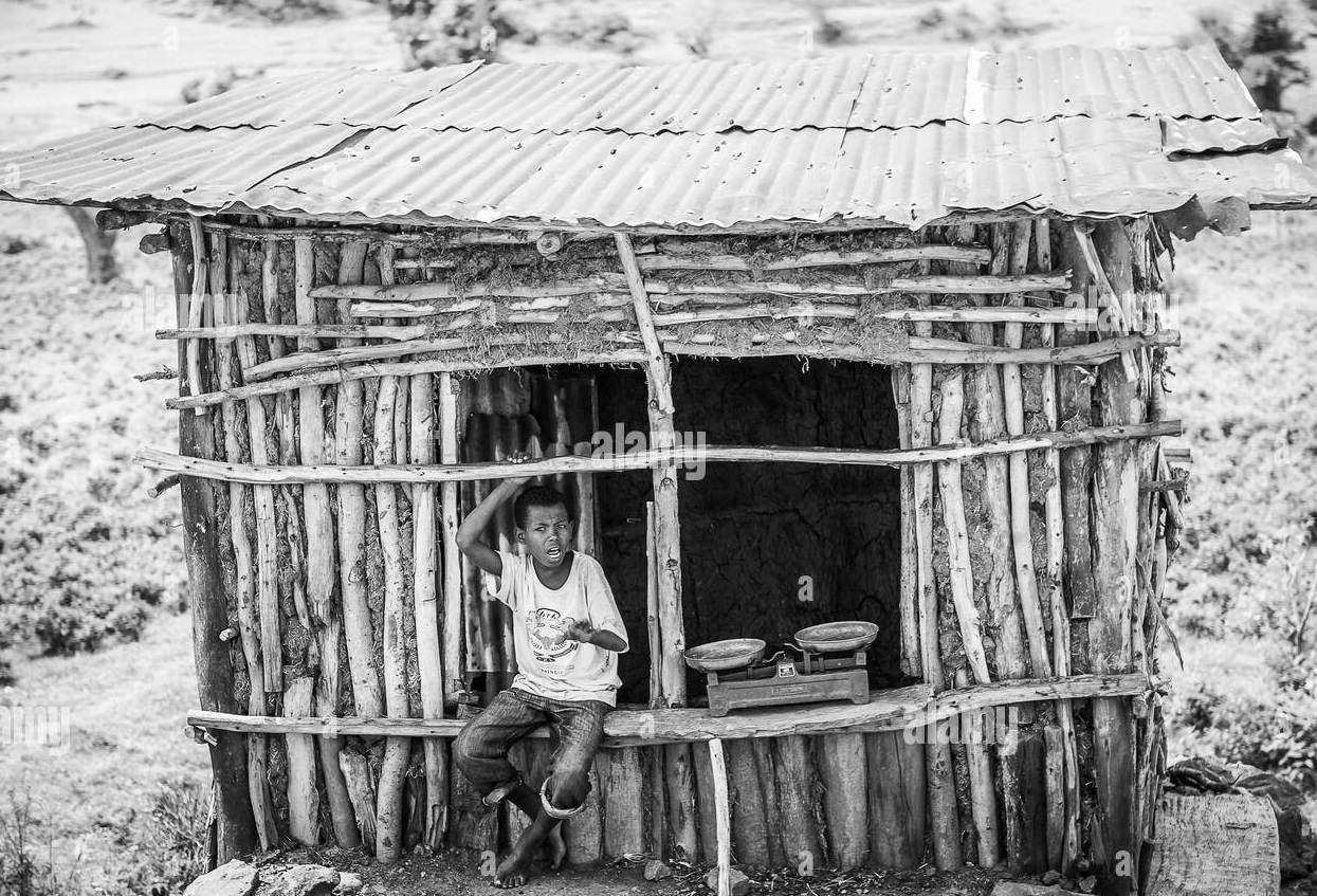 omo-ethiopia-september-19-2011-unidentified-ethiopian-man-near-a-wooden-house-people-in-ethiop...jpg