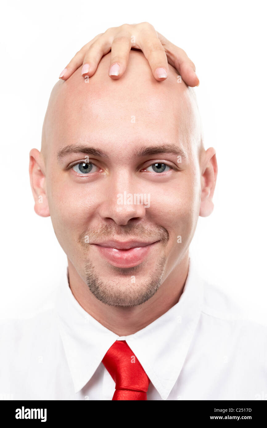 portrait-of-bald-man-with-female-hand-on-his-head-C2517D.jpg