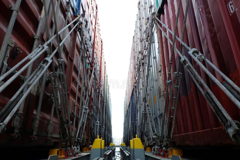 shipping-container-lashing-onboard-board-deck-cargo-ship-safety-plan-sea-120933477.jpg