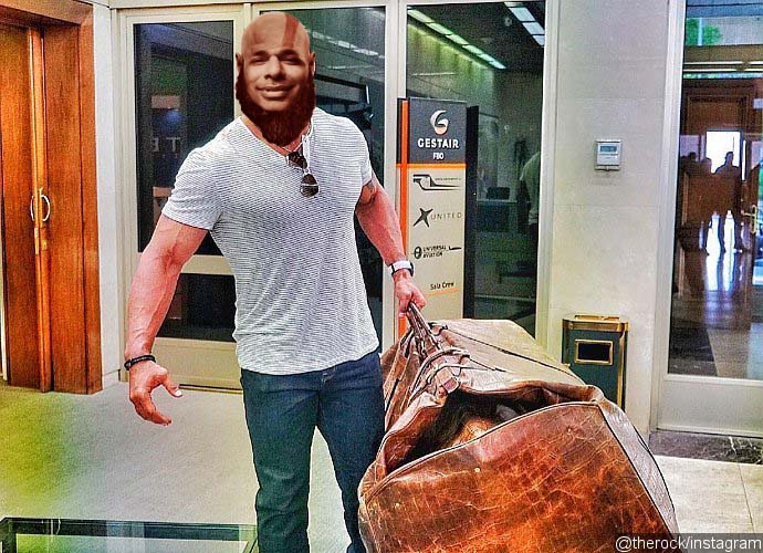 the-rock-carries-giant-bag-as-he-shares-tip-to-travel-light.jpg