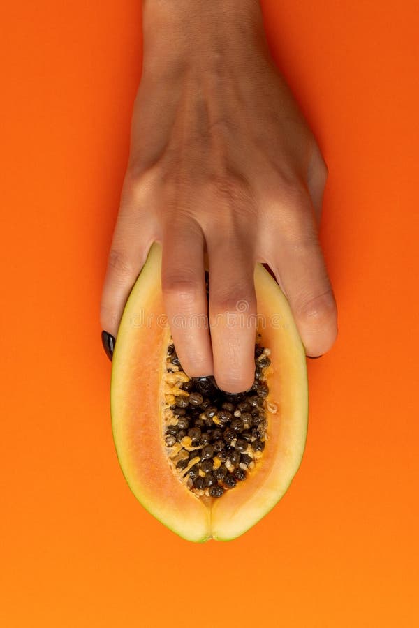 two-female-fingers-papaya-fruit-vivid-background-sex-concept-two-female-fingers-papaya-fruit-v...jpg