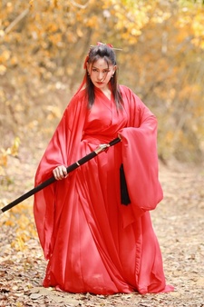 young-beautiful-asian-woman-dress-traditional-chinese-old-fashion-warrior-style-with-ancient-w...jpg