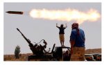 img_pod_An-anti-Gaddafi-fighter-rocket-in-a-village-outside-Sirte.jpg