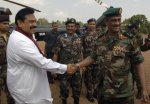 Sri Lanka's President Mahinda Rajapaksa (L) shakes hands with Army Commander Lieutenant General .jpg Sri Lanka's President Mahinda Rajapaksa (L) shakes hands with Army Commander Lieutenant General .jpg
