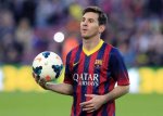 Lionel-Messi-with-the-match-ball-after-his-hat-trick-in-the-7-0-win-against-Osasuna.jpg