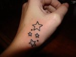 Small-Stars-Back-Hand-Tattoo-Design.jpg
