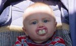 very funny baby with big front teeth.jpg