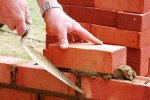 brick-layer-constructed-brick-wall.jpg