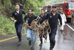 2633122036-pakistani-rescue-workers-rush-site-plane-crash-islamabad-pakistan-wednesday.jpg